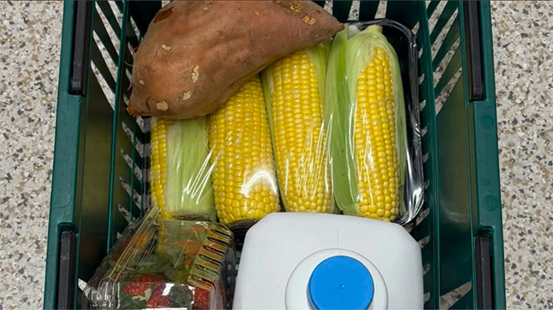 Corn, sweet potato, milk, and strawberries.