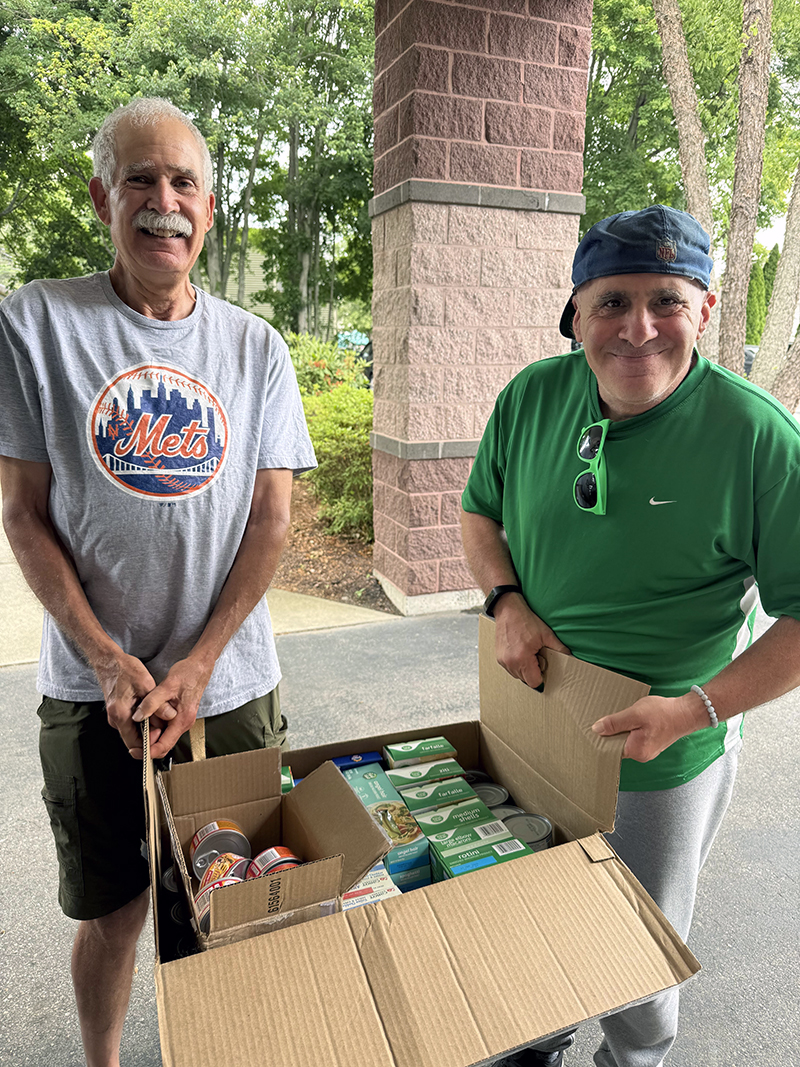 Bob and Eric generously donate to Bette’s Bounty Food Pantry.