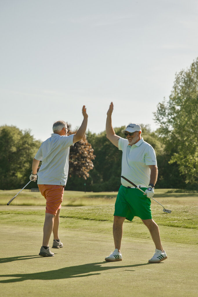 UCP_candids_19 High Five at the 2026 Golf Tournament